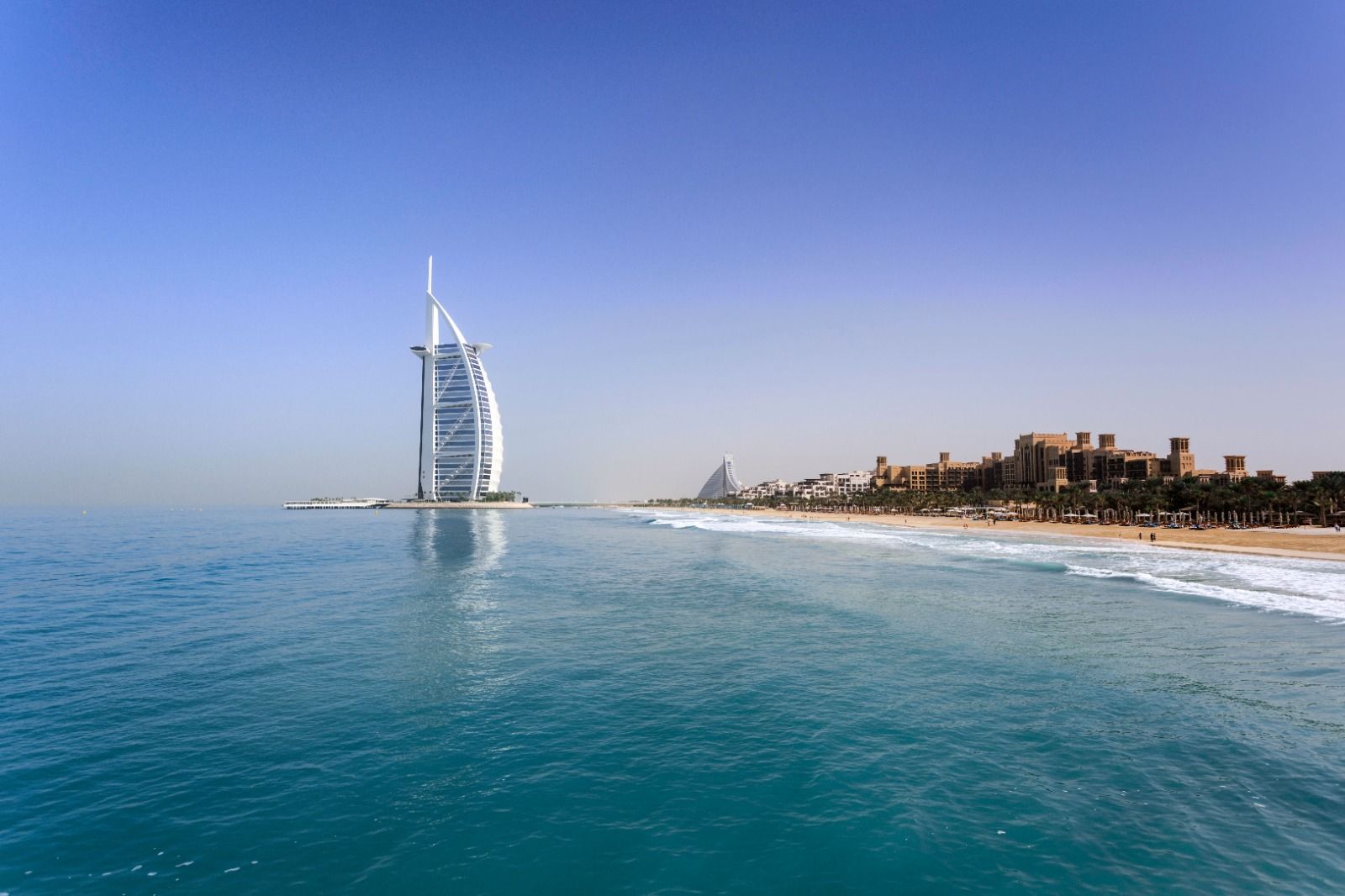 The Burj Al Arab hotel beside a Dubai beach